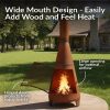 b9a70029-d7de-4ce6-97b3-98d31d94f72a.67d8344242a2ee7b1d026dbc8ee91048.jpg Sunnydaze 70″ Rust Patina Finish Steel Wood-Burning Chiminea with Spark Screen