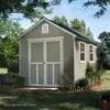 Installed Meridian 8 ft. x 10 ft. Wood Storage Shed with Autumn Brown Shingles