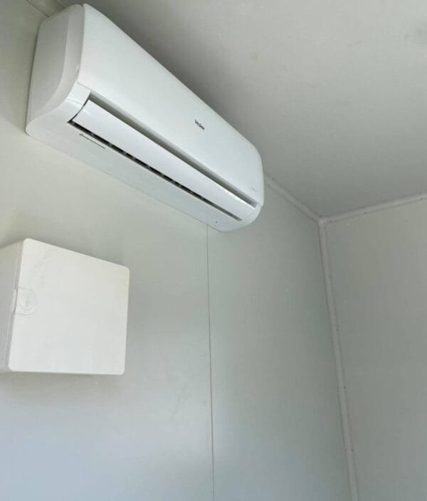 premiershippingcontainers_1600729416_2403415004736237187_4553681639-600x703-1-1.jpg 10’ office container with AC