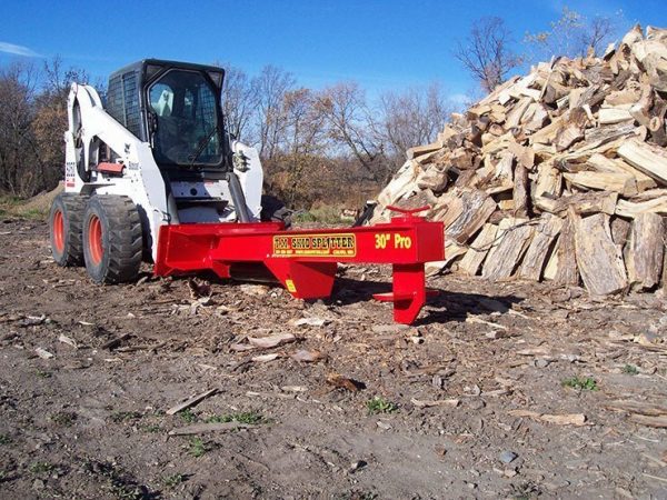 tm_pro-2_splitting_logs.jpg TM Pro 2 Log Splitter Skid Steer Attachment (24”, 30” or 36” Stroke)