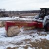 tm_pro_splitting_logs.jpg TM Pro Log Splitter Skid Steer Attachment (24”, 30” or 36” Stroke)